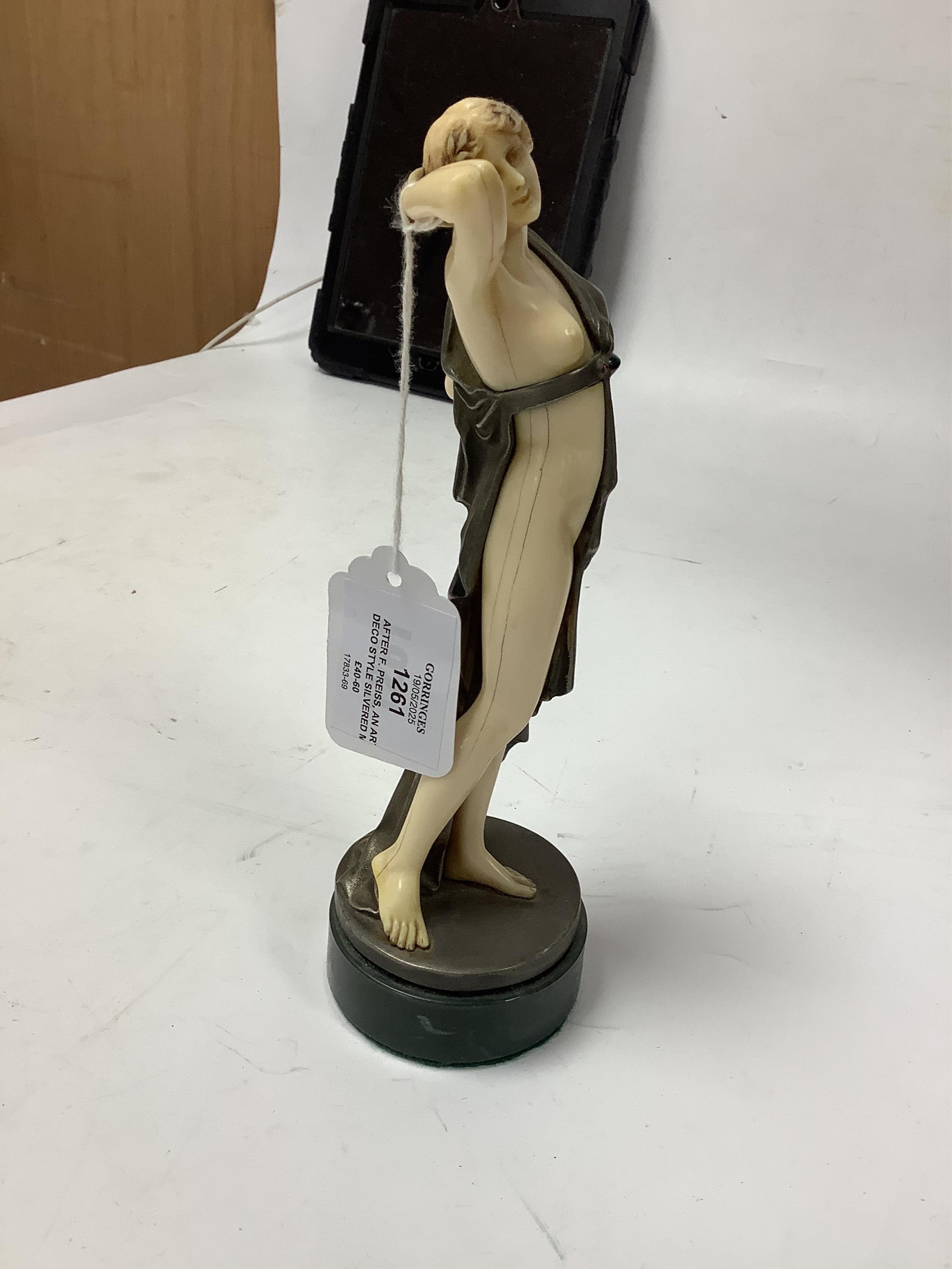 After F. Preiss, an Art Deco style silvered metal and ivorine figure, 'Vanity', 22cm high